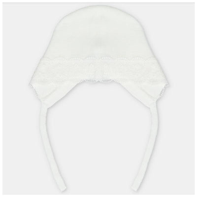 White knitted bonnet for babies, featuring lace trim and ties on the sides. Ideal for infant wear.