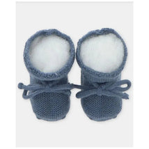 Light blue baby knit booties with white lining and decorative ties, designed for comfort and warmth.