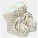 Martin Aranda booties in a sweater knit cotton blend, featuring a lace trim and bow detail, in a neutral color.