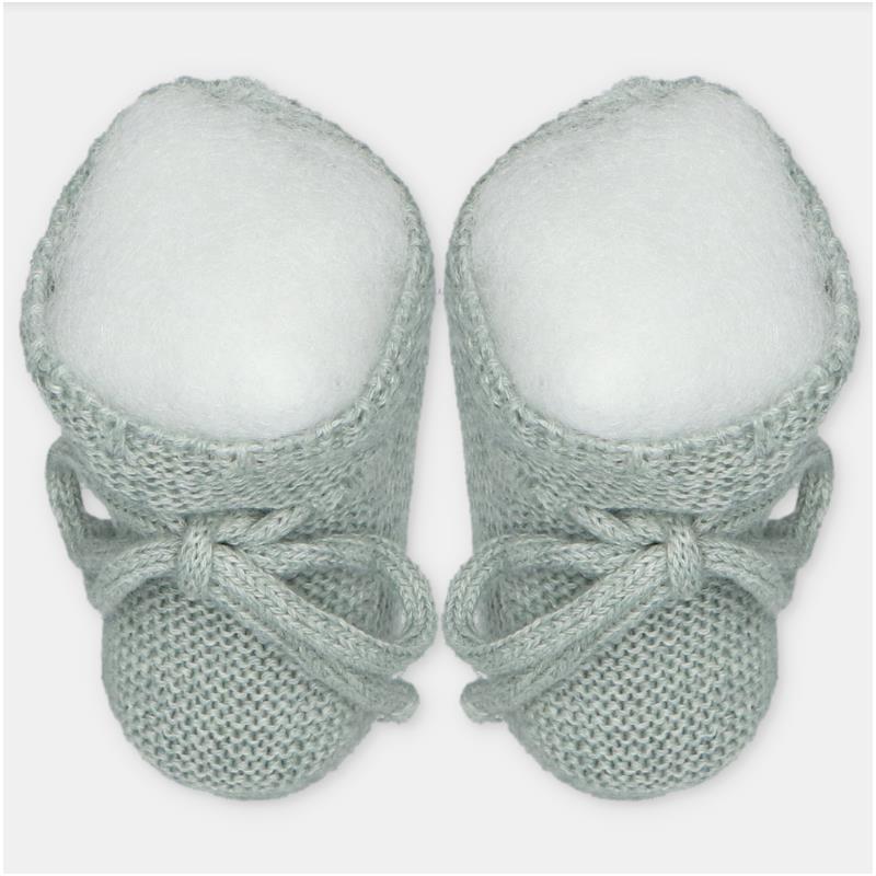 Sweater knit cotton blend booties in a soft mint color with tied laces and rounded toes, suitable for infants.