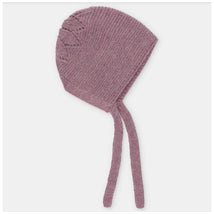 Draylon knit bonnet in Cotswold Rose color, featuring a textured design and two long ties for fastening.