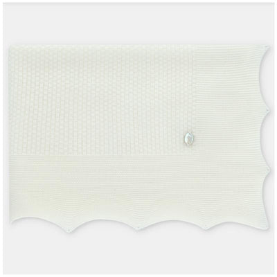Ivory Draylon sweaterknit blanket by Martin Aranda, featuring a textured pattern and scalloped edges.