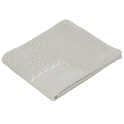 Martin Aranda Draylon sweaterknit baby blanket in stone color with decorative button detail
