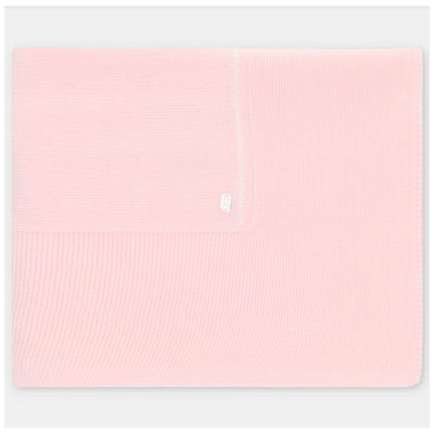 Pastel blue Draylon sweaterknit blanket by Martin Aranda, featuring a textured surface and a small logo tag.