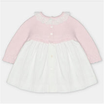 Martin Aranda dress features a light pink sweater knit bodice with a white fabric skirt and lace trim.