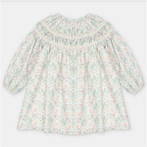 Woven floral dress in Pravia Green with puff sleeves and smocked detailing around the neckline.