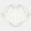 Woven fabric set dress and bloomer in white with polka dots, featuring smocked neckline and button closures.