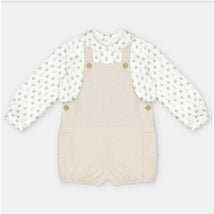 Martin Aranda beige overall and shirt set featuring a patterned long-sleeve top and button details on the overalls.