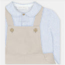 Martin Aranda shirt and overall set featuring a blue striped shirt with a collar and beige fabric overalls with wooden buttons.