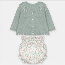 Martin Aranda sweater and bloomer set featuring a green knit sweater with a scalloped collar and floral patterned bloomers.