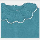 Knit cotton blend sweater in teal with a ruffled, white-trimmed collar, featuring a textured design.