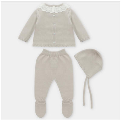 Knit outfit set in Newport Stone including a sweater with a lace collar, leggings, and a bonnet.