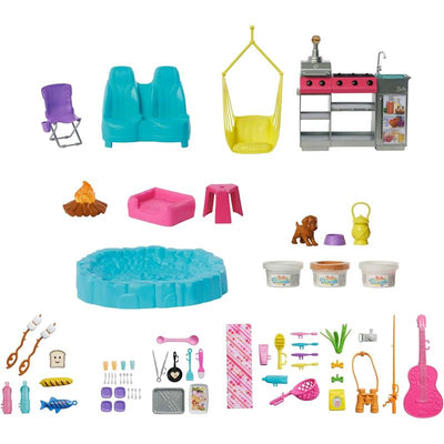 Barbie Dream Camper playset featuring a roof tent, chairs, cooking equipment, a campfire, a puppy, and various accessories.
