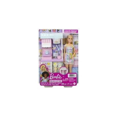 Barbie Ice Cream Shop Playset featuring Barbie doll in colorful outfit, ice cream accessories, and a shop backdrop.