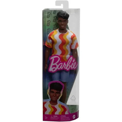 Barbie Ken Fashionista Doll features a male doll in a colorful wavy-pattern shirt and denim shorts, in packaging.
