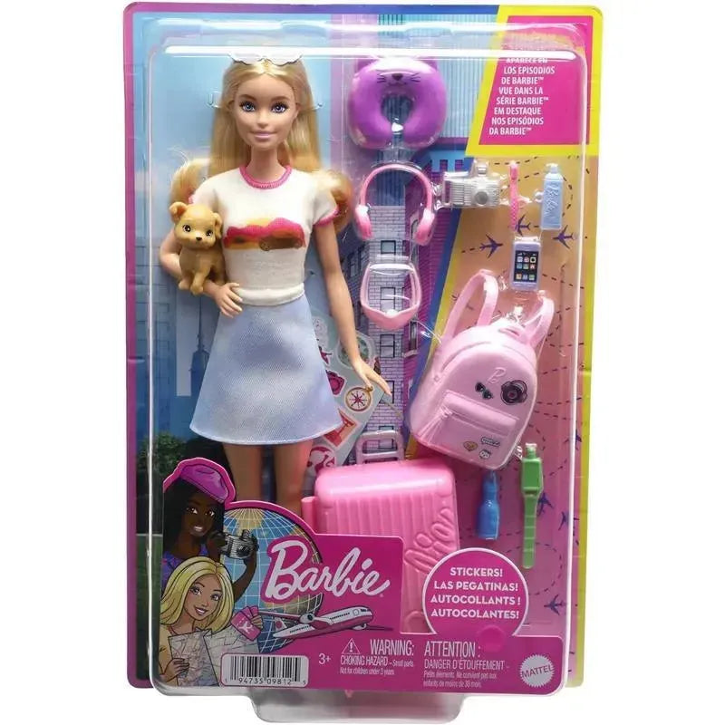 Barbie doll with a puppy, dressed in a colorful outfit, includes accessories like a camera, backpack, and suitcase.