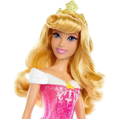 Disney Princess Core Doll of Aurora, featuring blonde hair, a pink gown, and a golden crown.