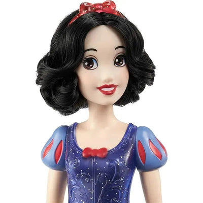 Disney Princess Snow White Fashion Doll with a blue dress and red accents, featuring black hair and a signature red bow.