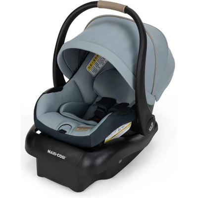 Maxi-Cosi Mico Pro Infant Car Seat in Seascape color, featuring a lightweight design, safety harness, and removable canopy.