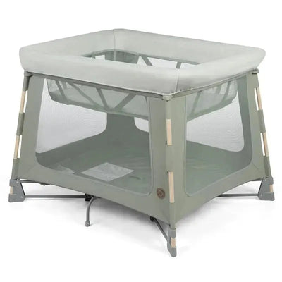 Maxi-Cosi Swift Play Yard in Classic Green, featuring a mesh design and a padded rim for safety and comfort.