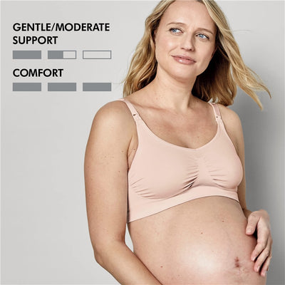 Seamless, breathable pregnancy bra in chai color, worn by a pregnant woman showcasing comfort and gentle support details.