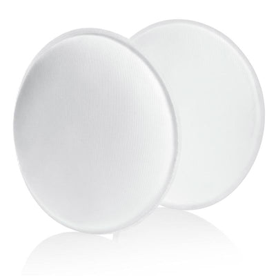 Washable nursing pads by Medela, round and white, designed for use during breastfeeding to absorb leakage.