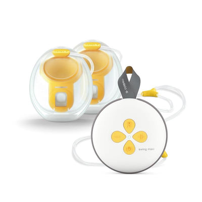 Medela Swing Maxi Hands-Free Breast Pump set with two collection cups and pump motor
