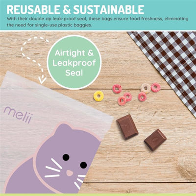 Reusable sandwich bags featuring a purple cat design, emphasizing airtight and leakproof seals, with snacks nearby.