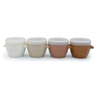 Four Melii 4 oz baby food storage containers in neutral colors with lids, featuring a curved handle and embossed brand logo.