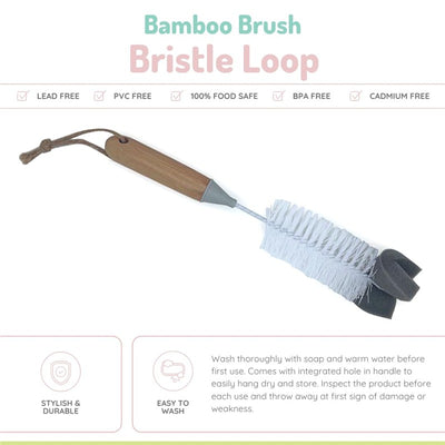 Bamboo baby bottle brush with bristles and sponge, featuring a wooden handle and a hanging loop for easy storage.