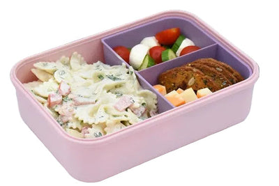 Melii Bento Box in pink and purple, featuring three compartments with pasta salad, vegetables, and a baked item.