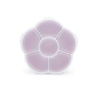 Flower-shaped snack container with five compartments, featuring a pink inner color and a white outer shell.