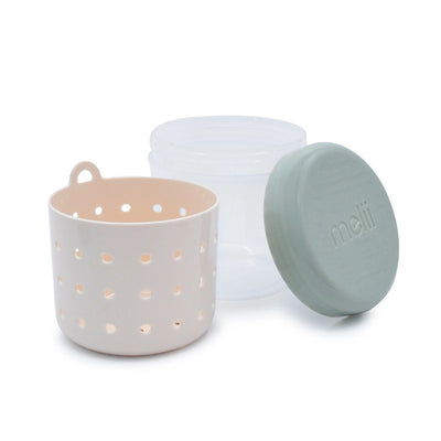 Melii Fruit Storage Container in sage and ivory, featuring a clear body, a perforated inner strainer, and a matching lid.