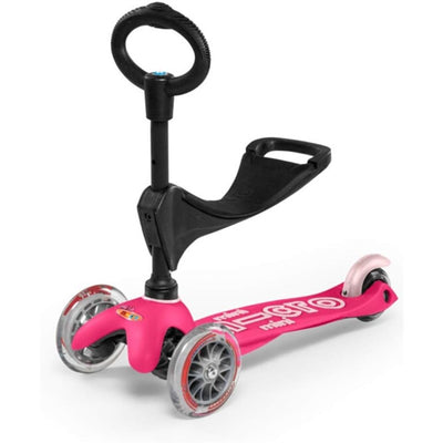 Pink Micro Kickboard - Mini 3in1 Deluxe scooter with a black handle, featuring three wheels and a footrest.