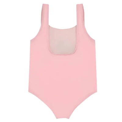 Pink one-piece swimsuit with a scoop neckline and wide straps, designed for girls, featuring a toy bear logo.