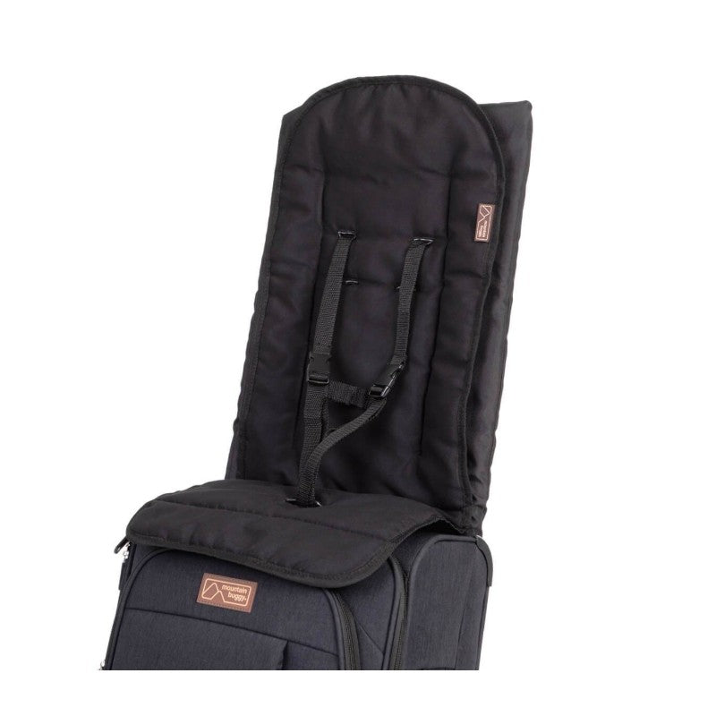 Luxury padded child carrier seat with adjustable straps, featuring the Mountain Buggy logo.