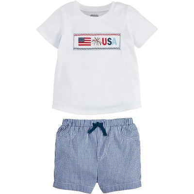 Short-sleeve white shirt with a red, blue, and green USA flag design paired with navy gingham shorts.