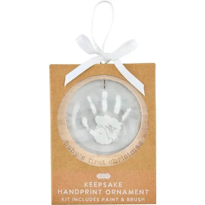 Keepsake ornament kit featuring a handprint design and includes paint and brush for personalization.