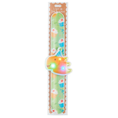 Light-up slap bracelet featuring a dinosaur design, colored cupcakes, and playful party elements.