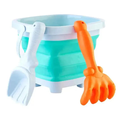 Collapsible blue baby bucket set with a white scoop and orange claw tool, ideal for outdoor play.