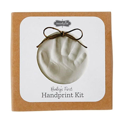 Mud Pie Christmas Ornament Baby Handprint Kit featuring a clay handprint mold, packaged in a decorative box with a bow.