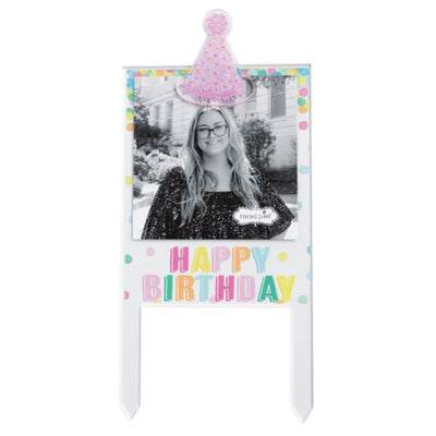 Happy Birthday cake topper frame by Mud Pie featuring a colorful design with a celebratory hat and a black-and-white photo slot.