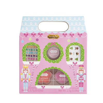 Kids Christmas Nutcracker Makeup Set by Mud Pie featuring shimmer powder and two lip glosses in festive packaging.