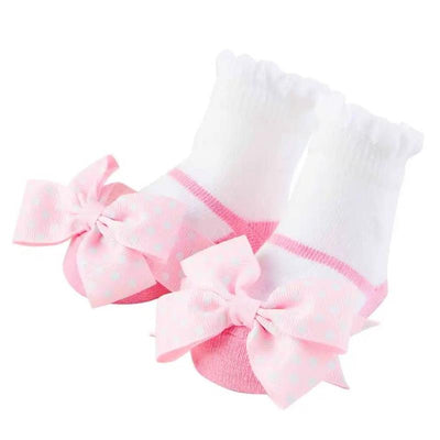 Pink Bow Mary Jane baby socks with polka dot details and ruffled tops, designed for infants aged 0 to 12 months.