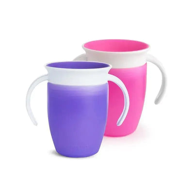 Miracle 360° Trainer Cups, 7 oz, in pink and purple, featuring ergonomic handles for easy gripping.