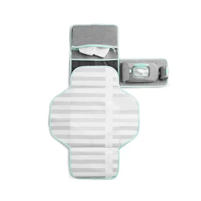 Munchkin Antimicrobial Diaper Changing Kit featuring a gray and white striped changing pad and storage compartments for wipes and diapers.