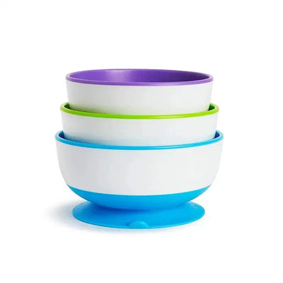 Suction bowls in assorted colors: purple, green, and blue, all with a white base, stacked together.