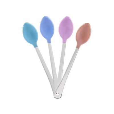 Four Munchkin White Hot Safety Spoons in blue, purple, pink, and peach, designed for feeding toddlers.