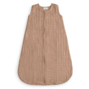 100% organic cotton muslin baby wearable blanket in a natural, beige color with a front zipper and sleeveless design.