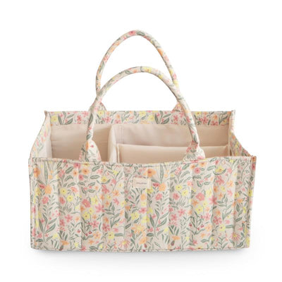 Mushie Baby Diaper Caddy in Pastel Blooms, featuring floral design and multiple compartments for organizing newborn essentials.
